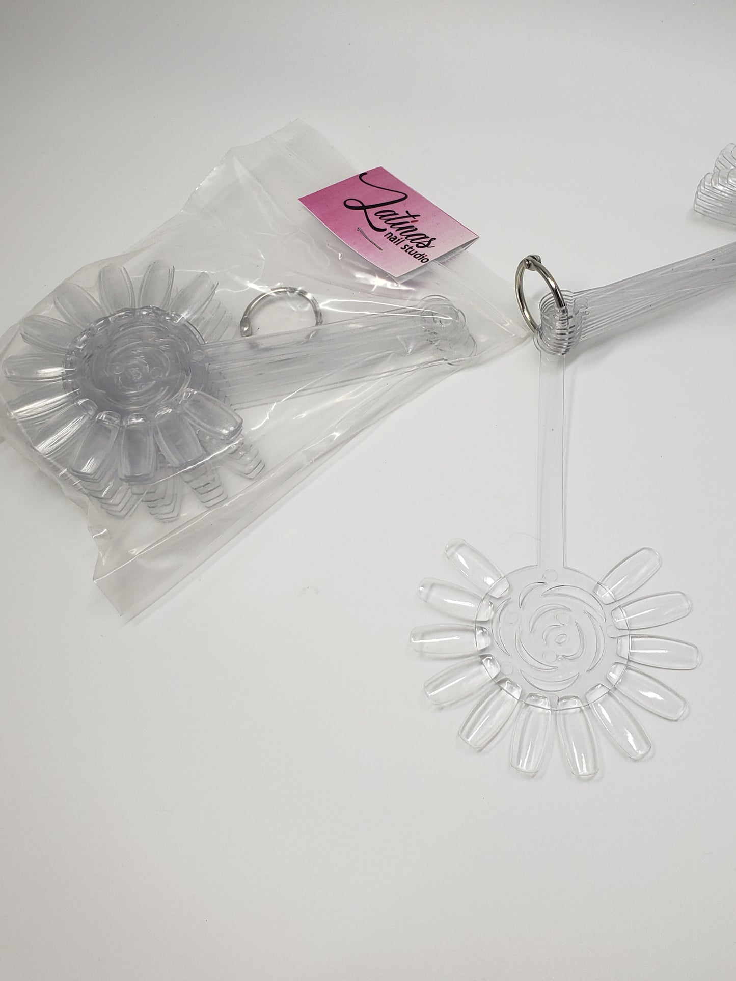 Latinas Nail Studio Carousel Nail Display image 0